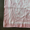 Silk scarf in baby pink print.