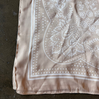 Silk scarf in beige print color.