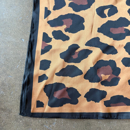Silk scarf in cheetah brown print.