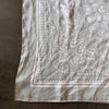 Silk scarf in pastel green print.